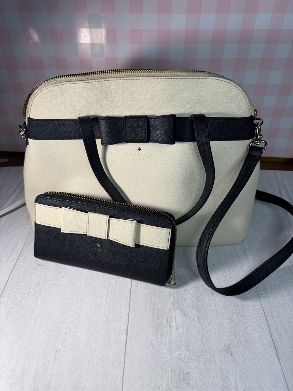 kate spade Cream and Black Bow Dome Satchel match with elegant wallet.